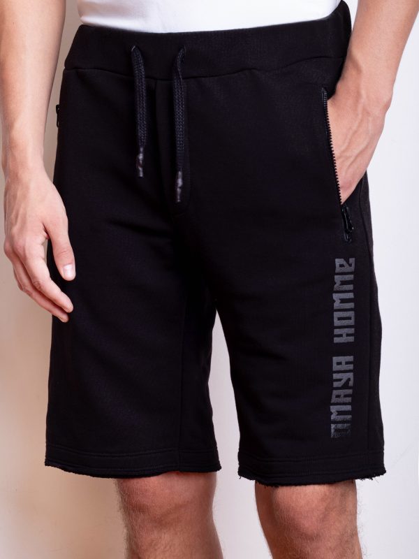 black shorts with zipped pockets